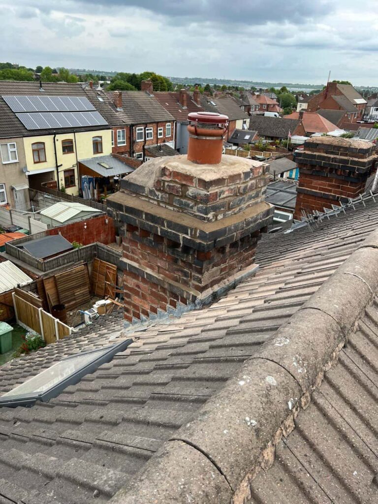 This is a photo taken from a roof which is being repaired by Haddenham Roofing Repairs, it shows a street of houses, and their roofs